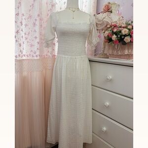 Reformation Marabella Smocked Square
Neck Midi Dress Cotton Puff Sleeve